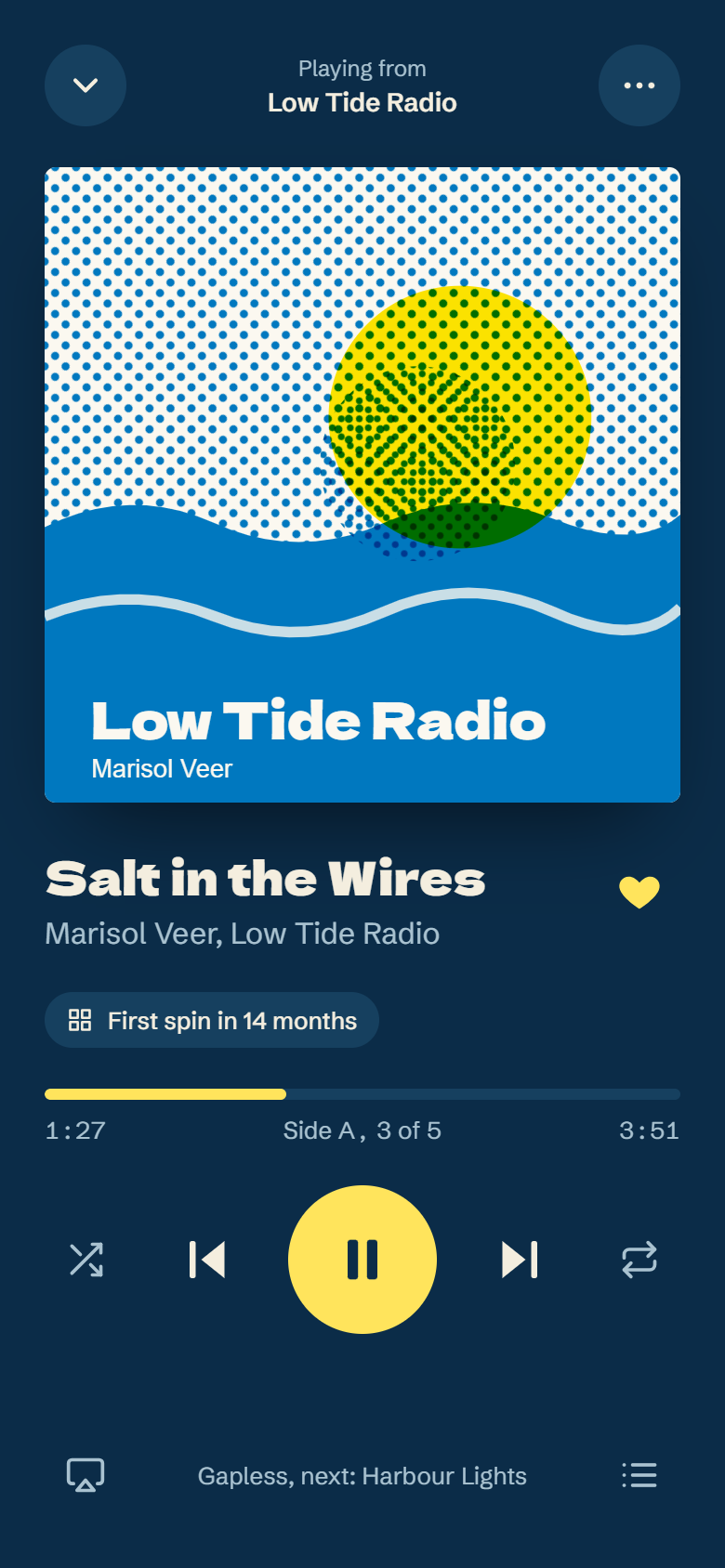 Now playing screen colored blue and yellow from the Low Tide Radio cover